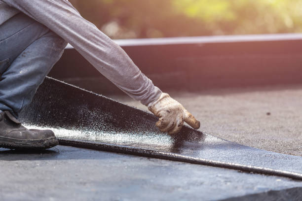 Professional Waterproofing technician working in Lakewood, NY